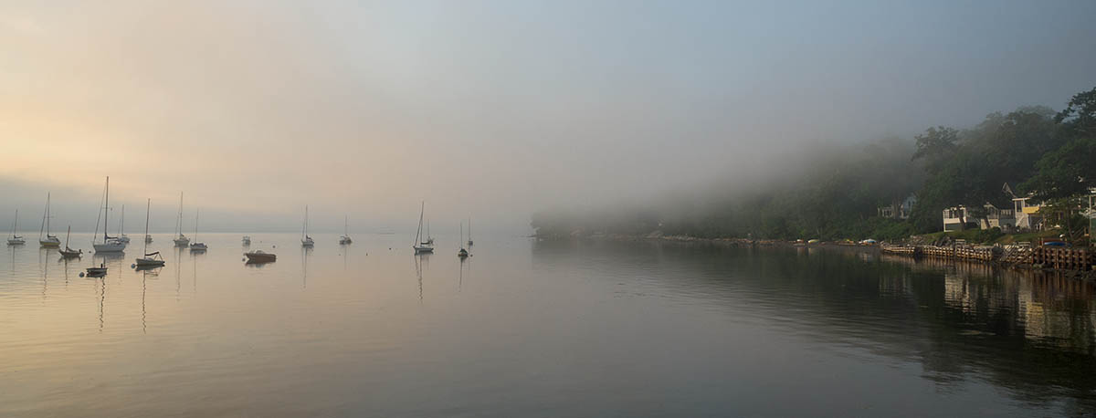 boats in harbor and clearing fog from Bayside's south shore